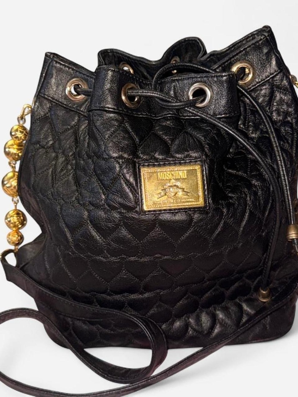 Moschino Black Quilted Leather Drawstring Crossbody with Gold Hardware
